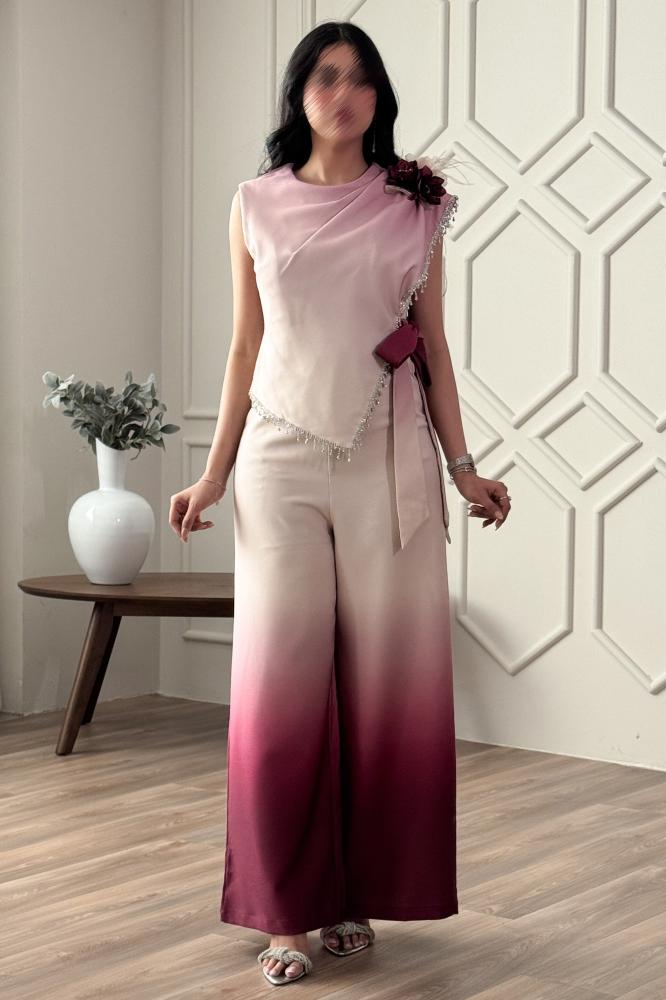 Jumpsuit with a tie at the waist and decorated with a brooch المقاس:(XL - 42)