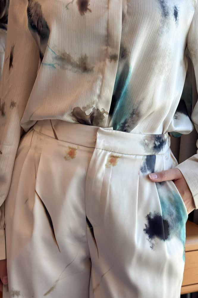 بنطال بطبعة ماربل لون بيج المقاس:(XL - 42)