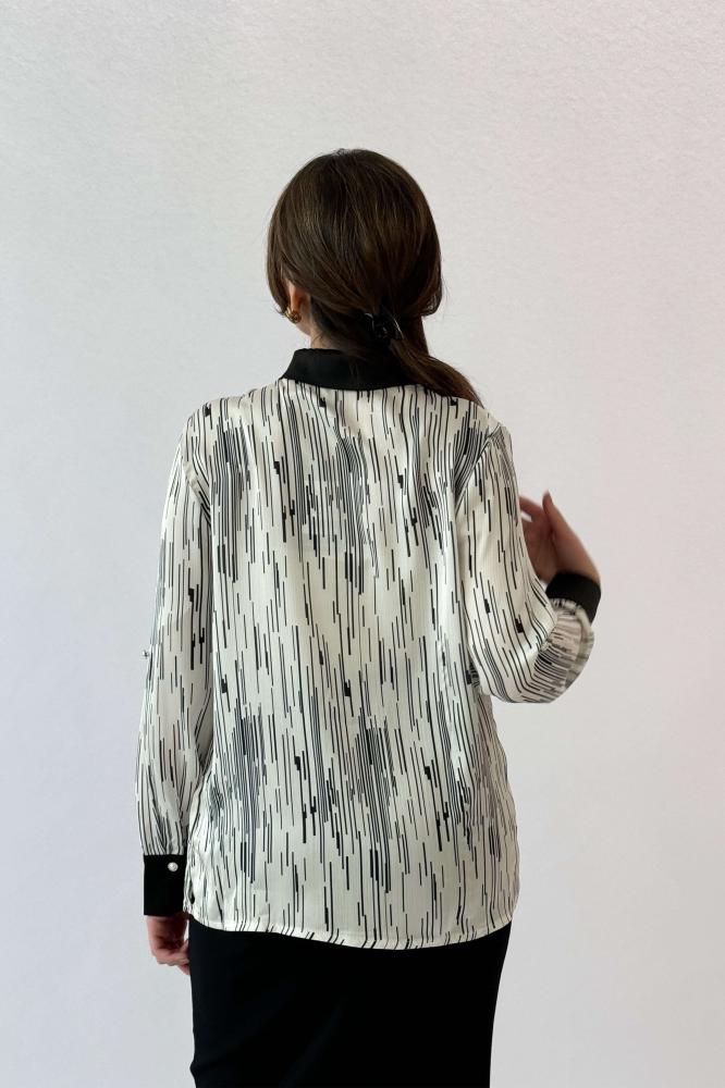 Floral print shirt with wide sleeves المقاس:(L - 40)