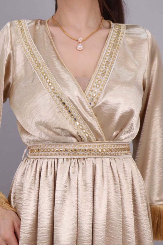 Embroidered dress design jalabiya decorated with gold fringe المقاس:(M)