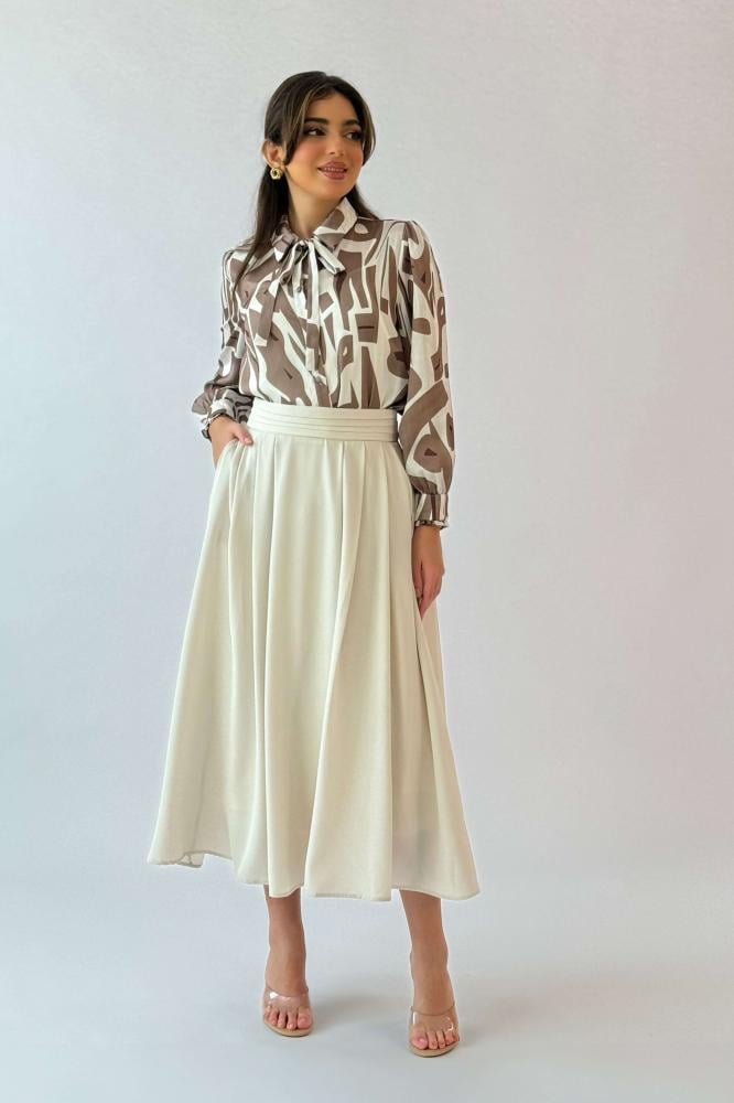 Beige midi flare skirt المقاس:(S - 36)