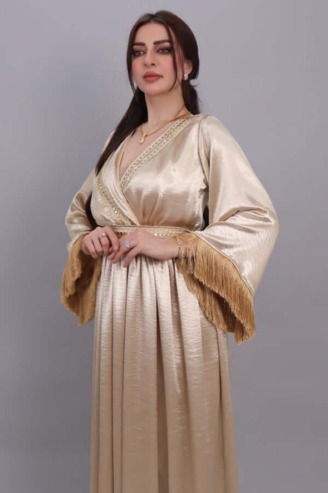 Embroidered dress design jalabiya decorated with gold fringe المقاس:(M)