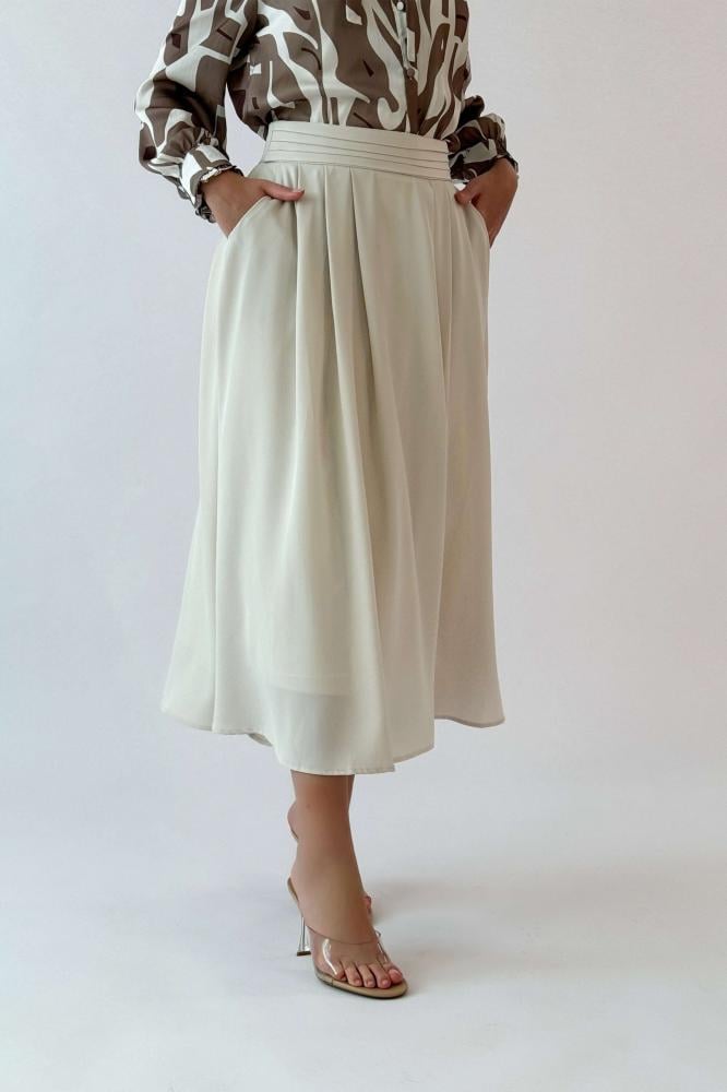Beige midi flare skirt المقاس:(S - 36)