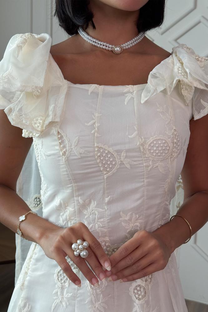 Beige midi dress with dropped shoulders and bow at the back المقاس:(L - 40)