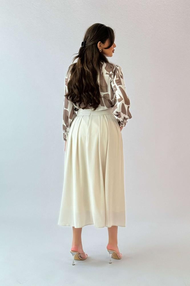 Beige midi flare skirt المقاس:(S - 36)
