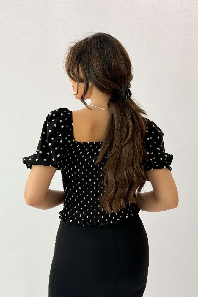 Black polka dot print ruffle effect blouse المقاس:(M)
