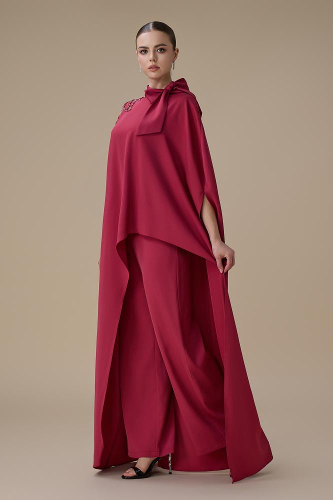 طقم جمبسوت فوشي بقصة انسيابية وتطريز كريستالي المقاس:(XL - 42)