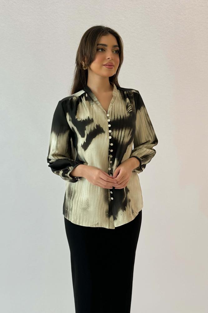 Beige printed button-up shirt المقاس:(XL - 42)