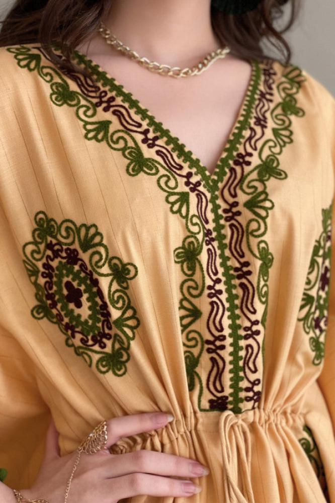 Yellow embroidered butterfly jalabiya المقاس:(M)