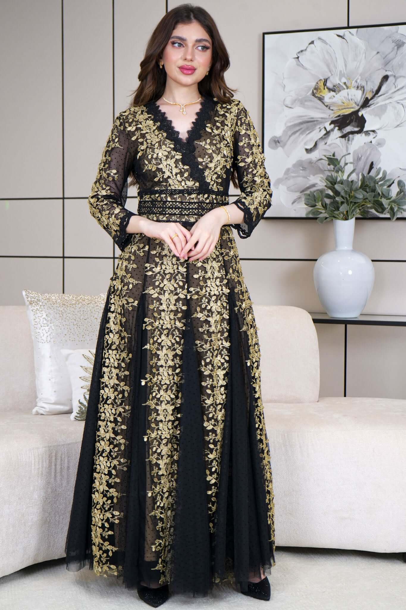 Long evening dress with golden cost