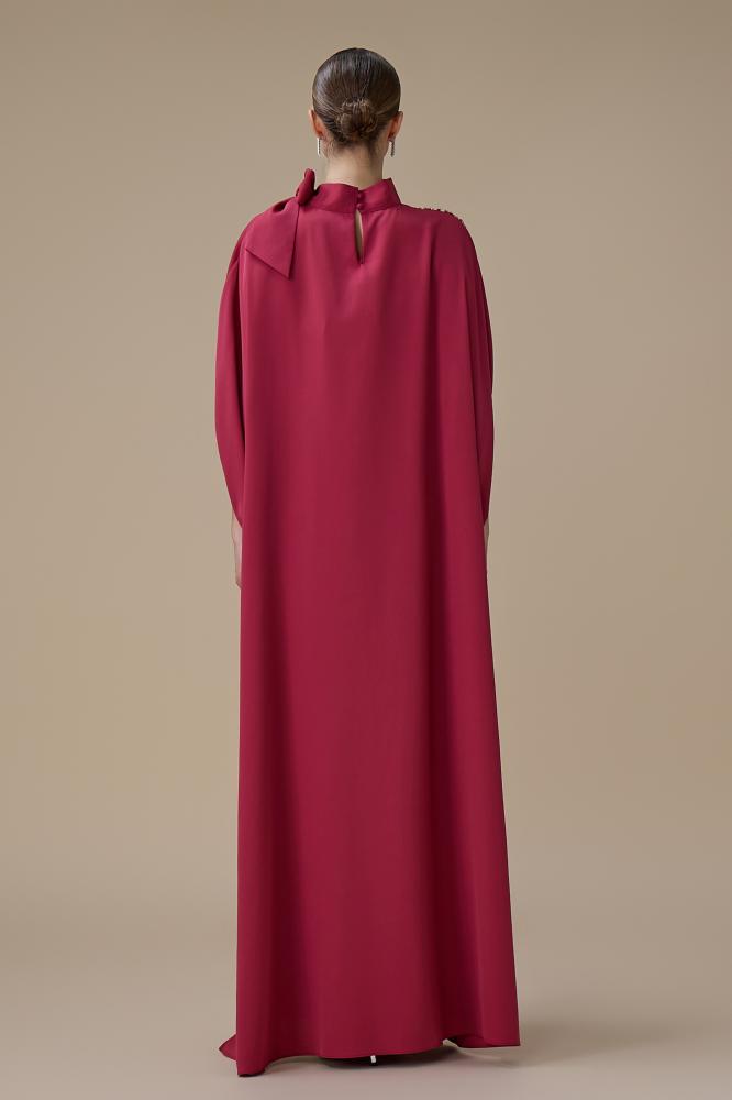 طقم جمبسوت فوشي بقصة انسيابية وتطريز كريستالي المقاس:(XL - 42)