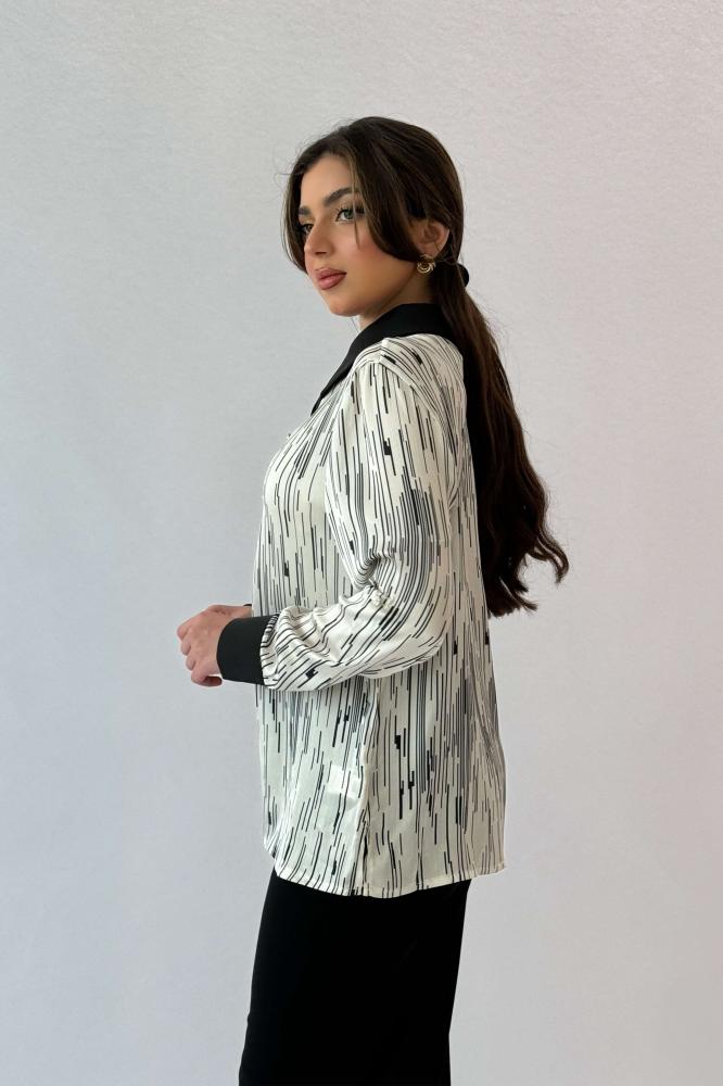 Floral print shirt with wide sleeves المقاس:(L - 40)