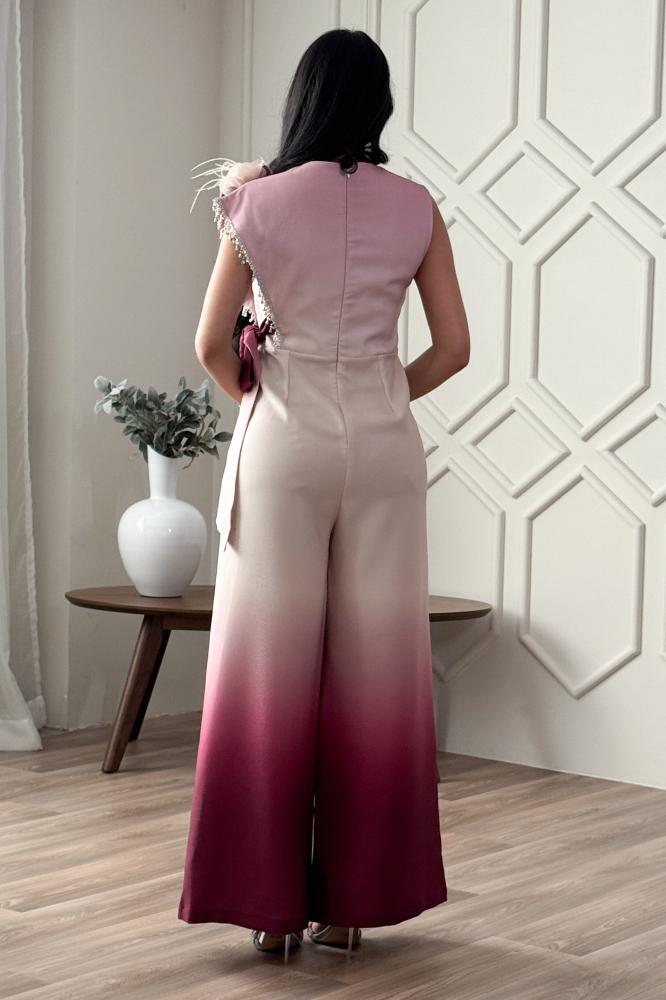 Jumpsuit with a tie at the waist and decorated with a brooch المقاس:(XL - 42)