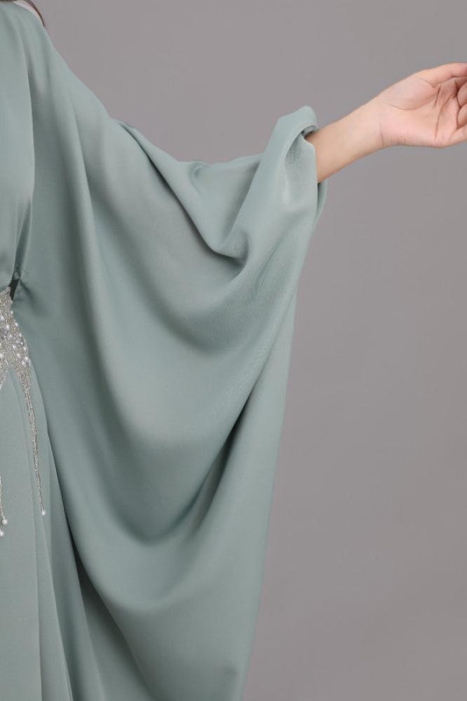 Modern jalabiya with a distinctive design, embroidered with beads and pearls, Tiffany color المقاس:(L)