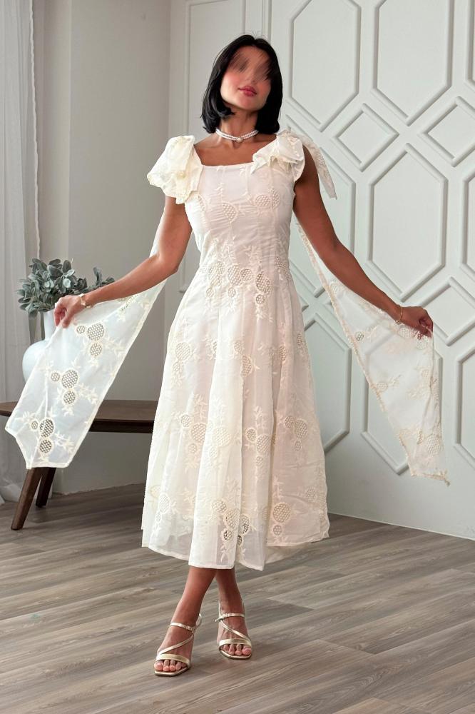 Beige midi dress with dropped shoulders and bow at the back المقاس:(L - 40)