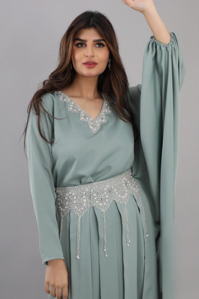 Modern jalabiya with a distinctive design, embroidered with beads and pearls, Tiffany color المقاس:(L)
