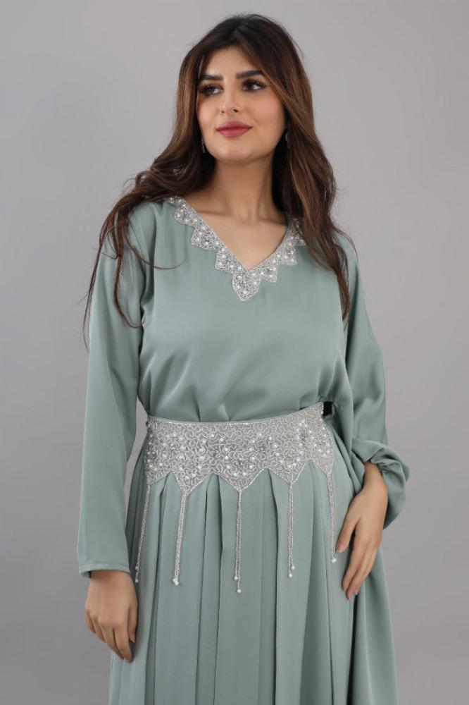 Modern jalabiya with a distinctive design, embroidered with beads and pearls, Tiffany color المقاس:(L)