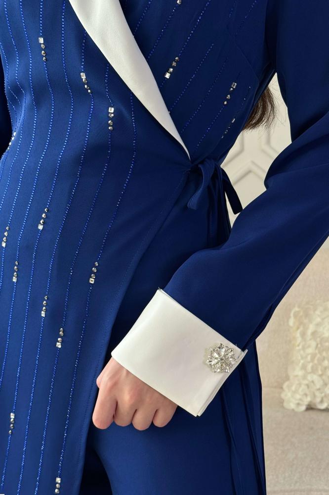 Blue sequin wrap jumpsuit المقاس:(L - 40)