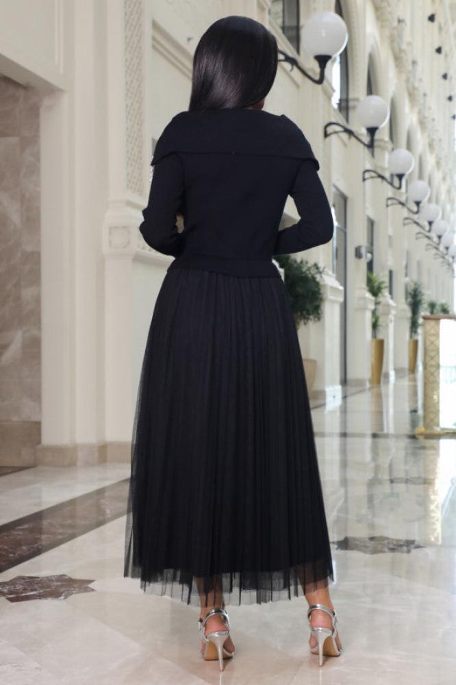 Black pearl embellished midi dress المقاس:(L - 40)