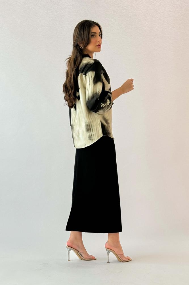 Beige printed button-up shirt المقاس:(XL - 42)