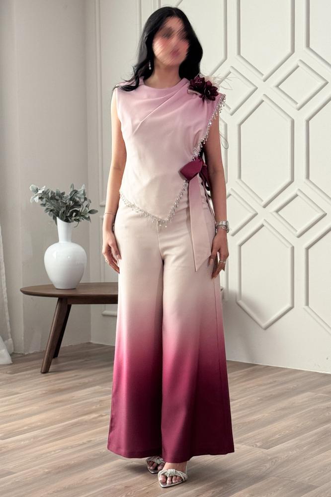 Jumpsuit with a tie at the waist and decorated with a brooch المقاس:(XL - 42)