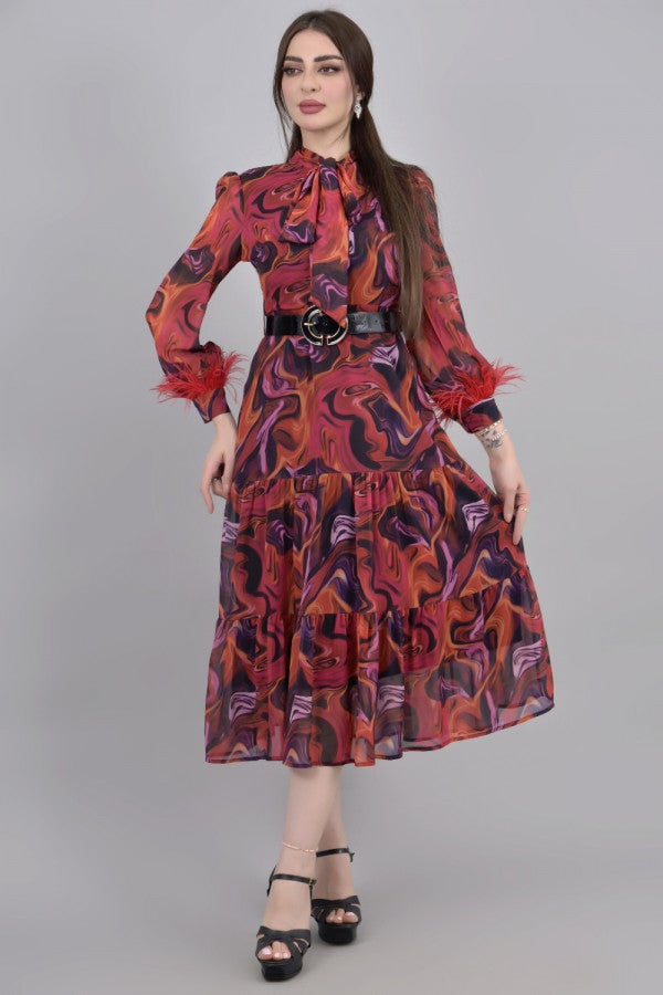 Wavy chiffon dress decorated with red feathers