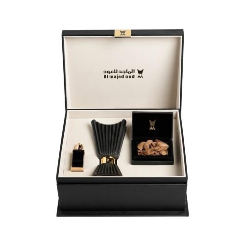 Small black leather gift box (Al Majed medium incense burner - Al Adhariya oil - Arin oud no. 50 - 28g)