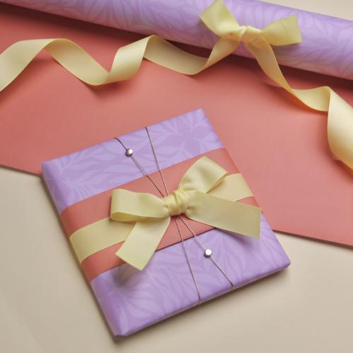 ورق تغليف - تصميم بنفسجي/برتقالي