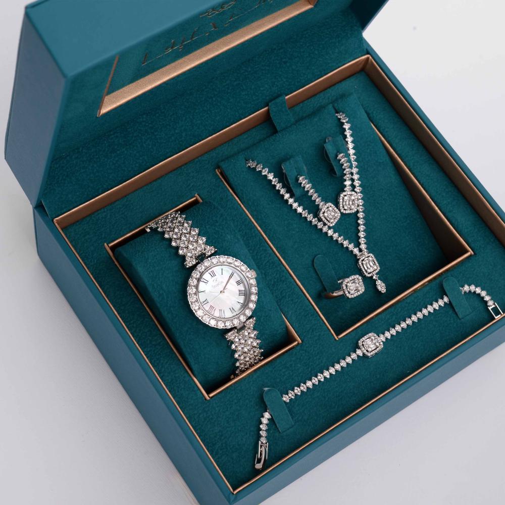 طقم نسائي سهرات  ماركة جورج كلاين GK-51015 (ساعة+سلسال+حلق+خاتم+اسواره ) فضي