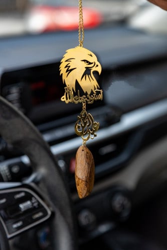 تعليقة صقر بكسرة العود
