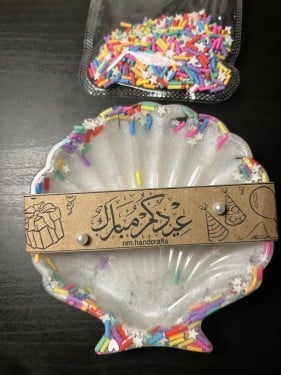 صحن اكسسوارت صدفة بالريزن + حلق