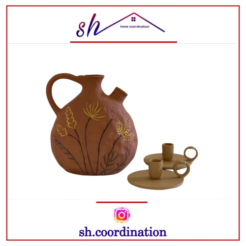 مزهريه فخار مع حاملين شمع