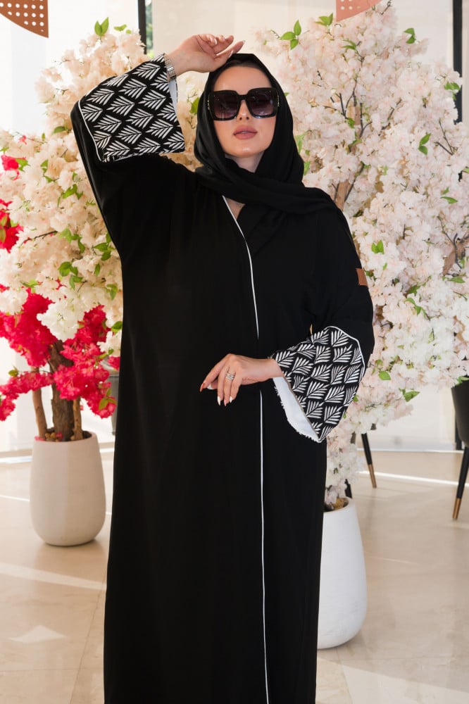 White and black on sale abaya