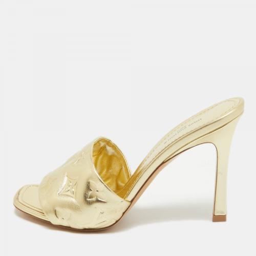 Louis Vuitton Gold Monogram Embossed Leather Reviv...