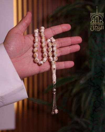 سبحة من عاج الفيل مطعم بالكهرمان و الفضة