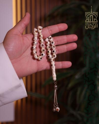 سبحة من عاج الفيل مطعم بالكهرمان و الفضة