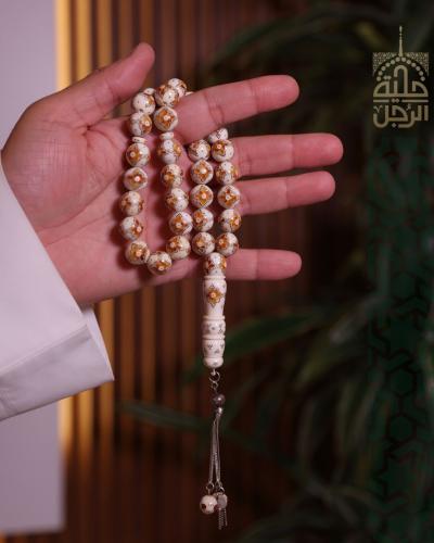 سبحة من عاج الفيل مطعم بالكهرمان و الفضة