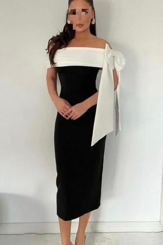 فستان أسود ناعم بفيونكة جانبية