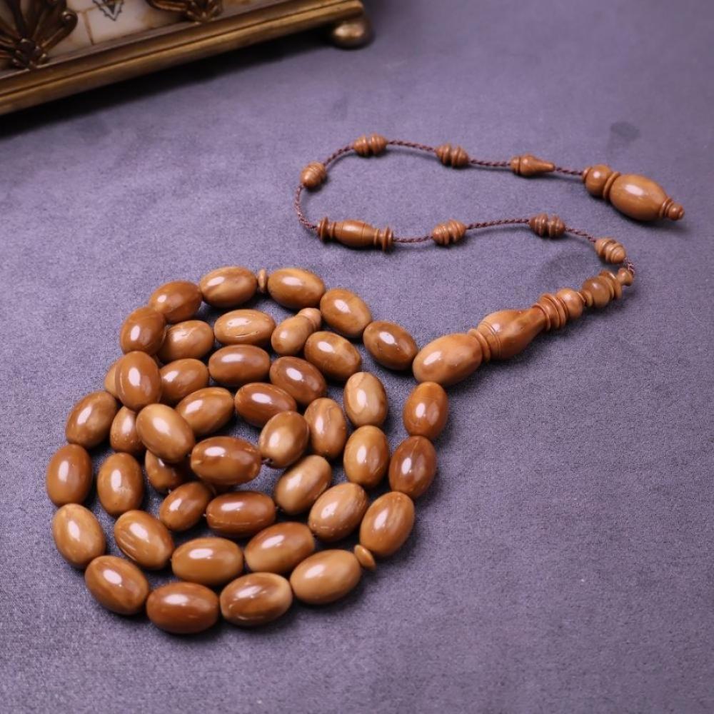 سبحة الكوك الأصلية: الفرق بين الطبيعي والمطعّم بالفضة وكيف تميّزها