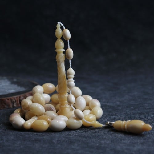 سبحة عظم جمل شاهد منقوش