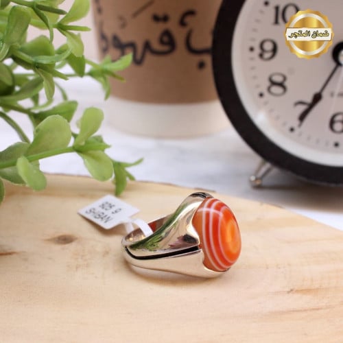 خاتم مع حجر لون برتقالي