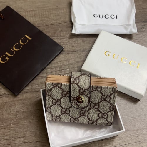 محفظة جوتشي بملحقاتها