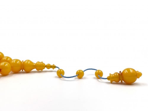 سبحة من دومنة مكركة انعكاس احمر بشفافية صب قديم خراطة خليل التركي