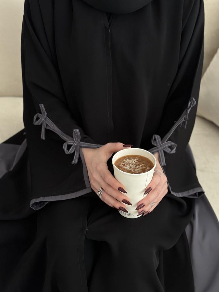 عبايه شتويه تمنحك شعورا بالاناقه والراحه