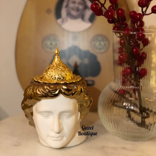 مبخرة وجه ذهبية