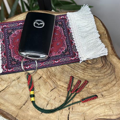 ميدالية كركوشة خضراء بأحمر