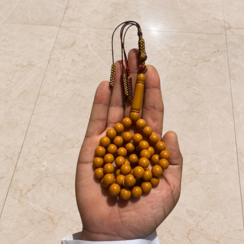سبحة بكلايت كراميل كركوشة عنابي