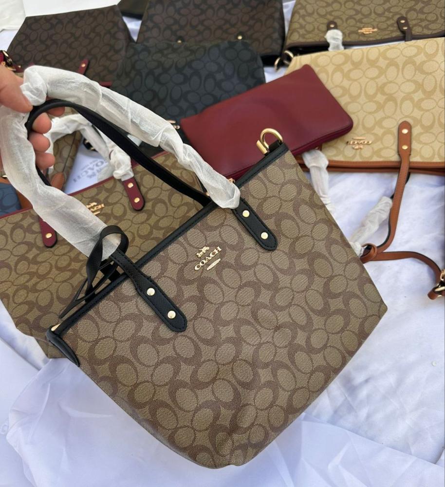 شنطة كوتش جلد