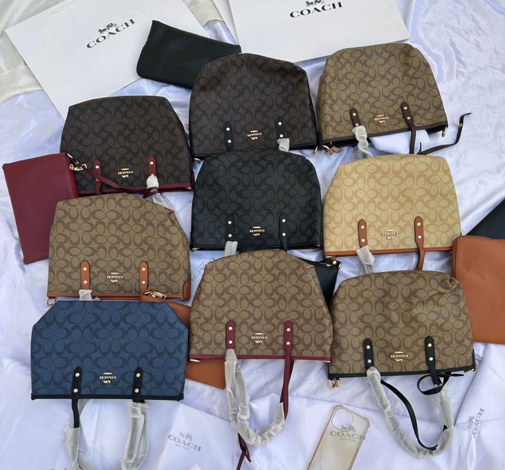 شنطة كوتش جلد