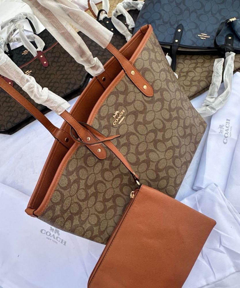 شنطة كوتش جلد